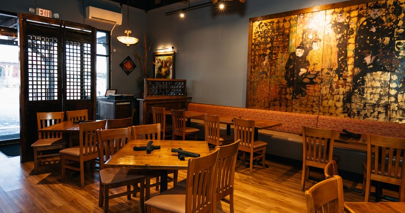 Modern interior dining area with set dining tables