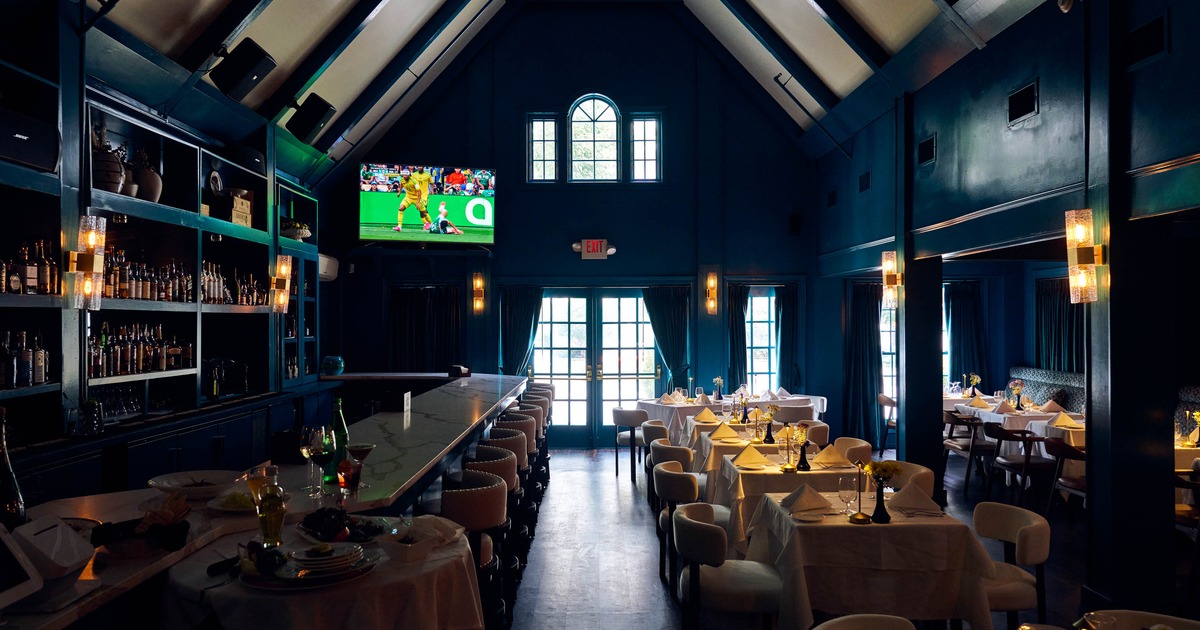 Interior, tables and chairs ready for guests