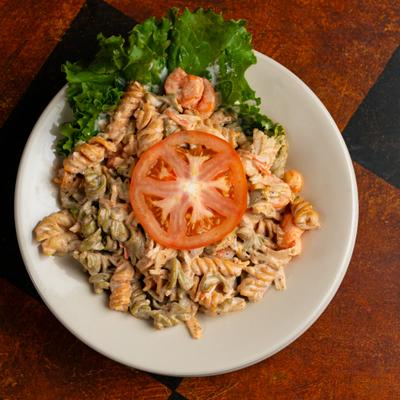 Seafood Pasta Salad - shrimp, scallops, and crabmeat w/ spiral pasta tossed with our special dressing. Served Hot or Cold.