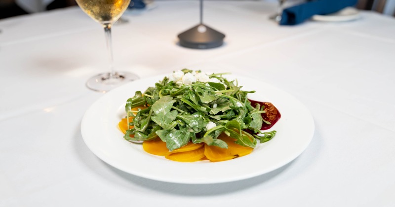 Beet Salad with arugula and crumbled cheese