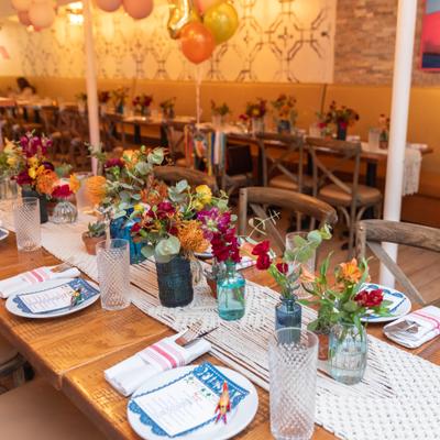 Tables set for a large event.