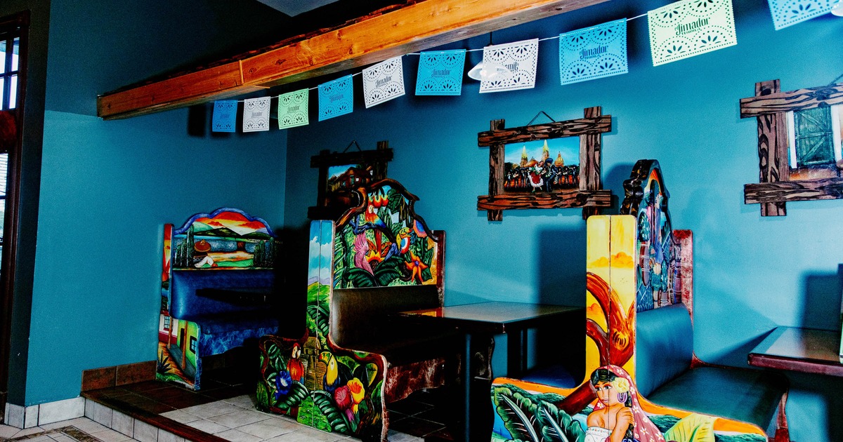 Interior, colorful restaurant booths