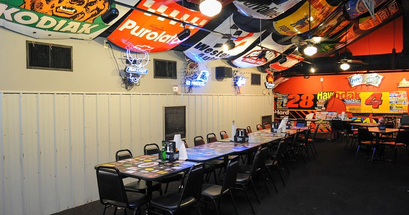 Interior, dining tables and seats, decorative banners on the ceiling