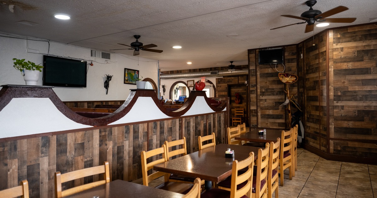 Diner tables, chairs, booths behind