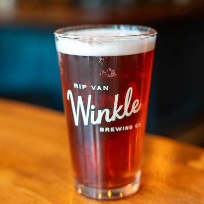 A glass of red beer.