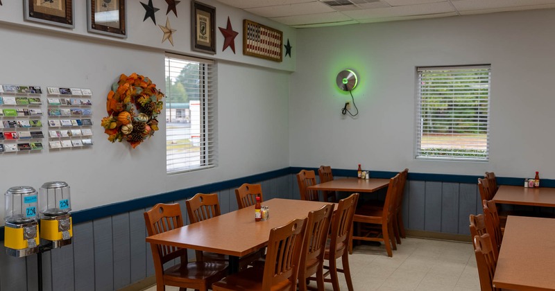 Interior, wooden dining tables and chairs