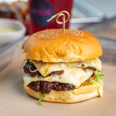 Ground beef and chorizo smash burger with melted cheese.