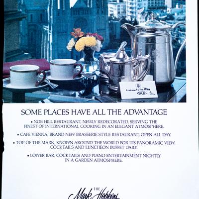 Elegant tea table setting with city views and highlights below promoting restaurants and bars