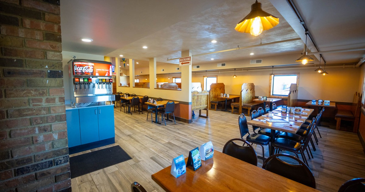 Interior, dining area, tables ready for guests