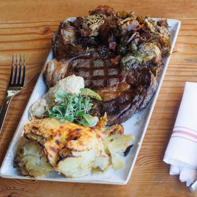 Grilled Ribeye with sage gratin, Brussel sprouts and horseradish aioli.