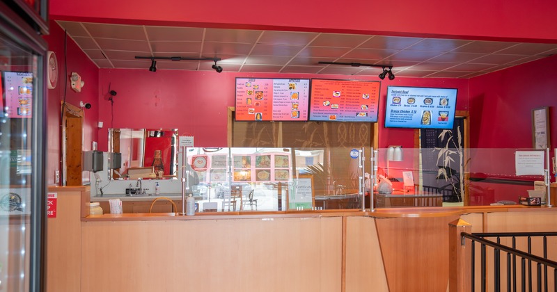 Interior, food counter, tv's above