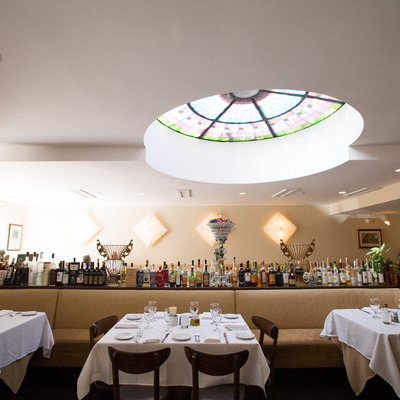 Restaurant dining room, with circular ceiling window.