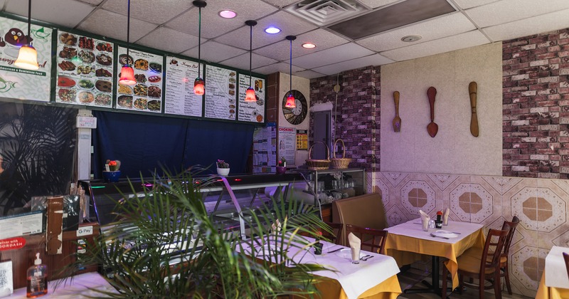 Interior, dining area with set tables