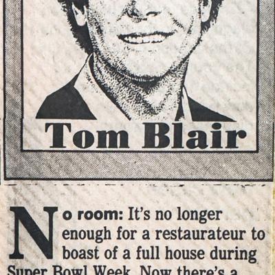 An old newspaper clipping featuring a headshot of Toma Blair