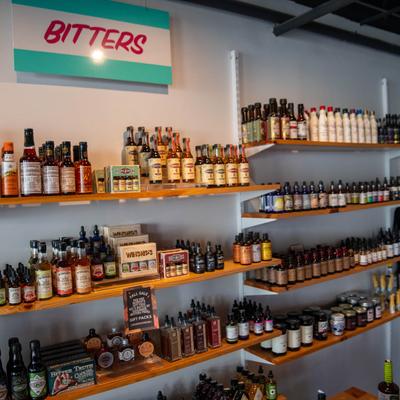 Assorted bitters on the shelves.