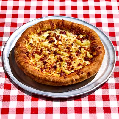 Cheese pizza on a metal pan.