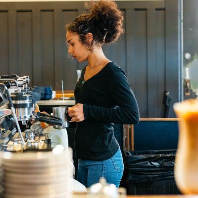 Barista making coffee.