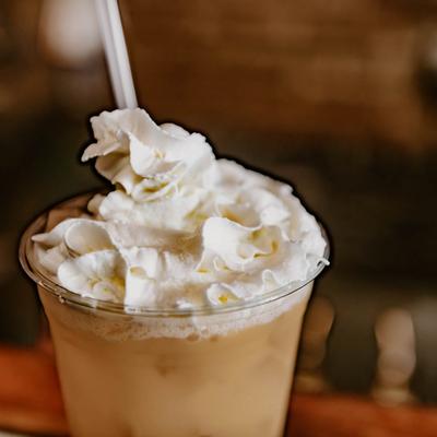 Creamsicle cocktail, with whipped cream.