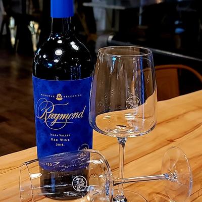 A wine bottle and blasses.