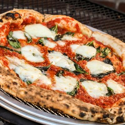 A whole Margherita pizza.