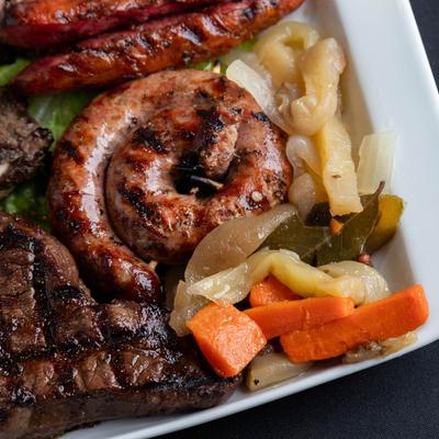 The Grilled Sampler with various meats and veggies.