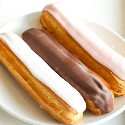 Vanilla, chocolate, and caramel eclairs.
