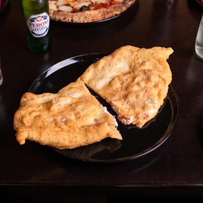 Fried pizzas.