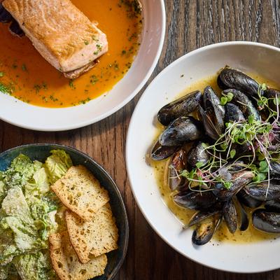 Mussels, salmon, and Caesar salad.