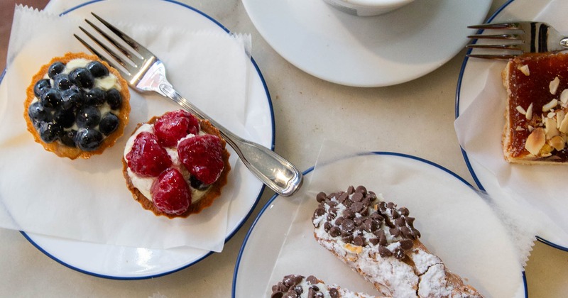 Assorted pastries and latte