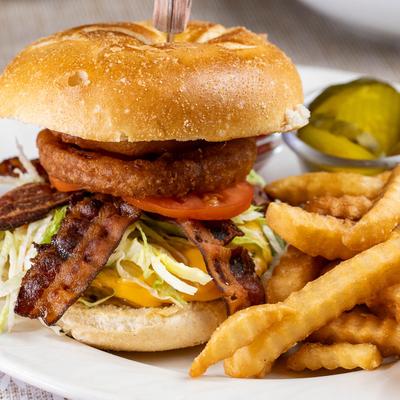 Cowboy Burger and fries, close up.