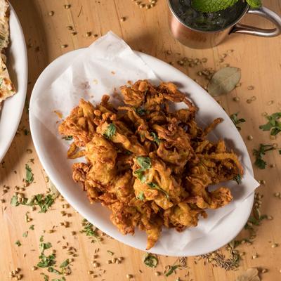 Mildly spiced onions in chickpea batter.