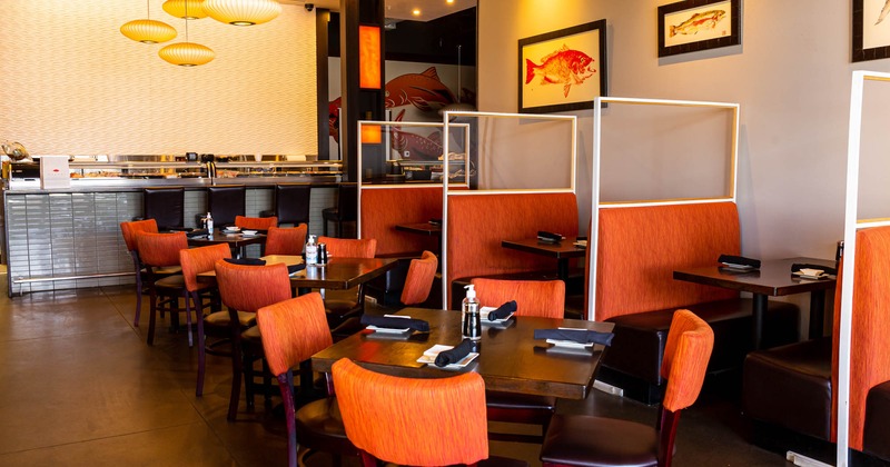 Interior, tables for four and restaurant booths