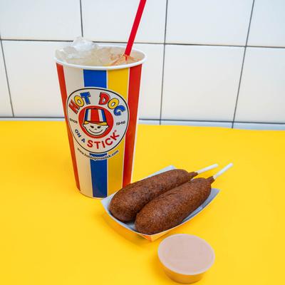 Corndogs and a soda.