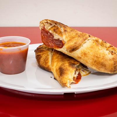 Pepperoni stromboli served with marinara dipping sauce.