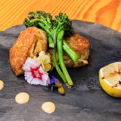 Crab cakes with broccolini.