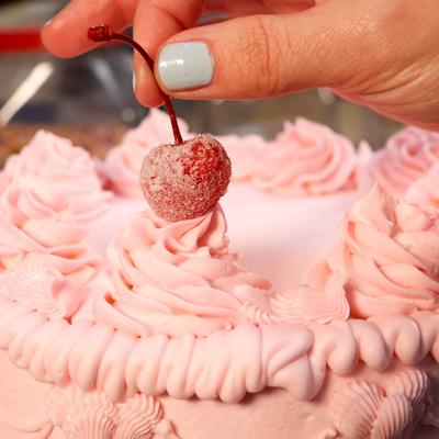 Cake with pink frosting.