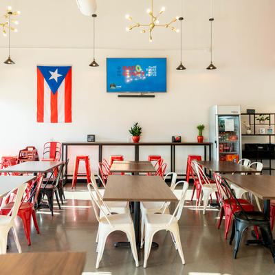The restaurant's interior, tables and chairs.