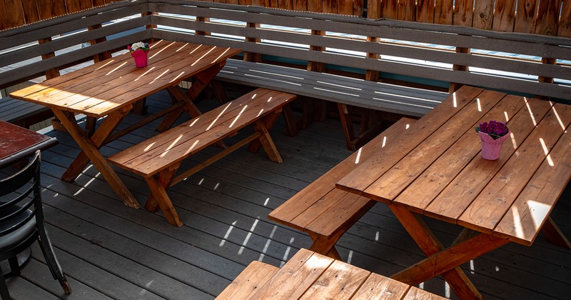 Patio, wooden tables with benches