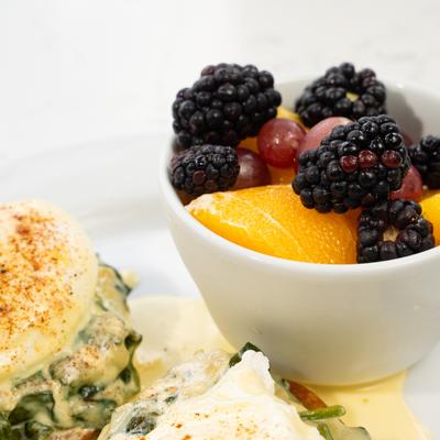 Egg Sardou and fresh fruits.