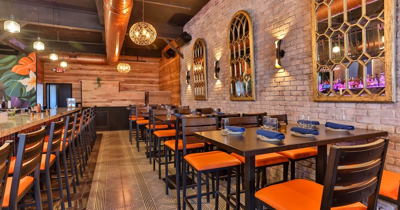 Interior, tables and chairs, glasses and tableware on the tables