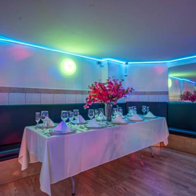 A formal dining setup in an indoor venue.