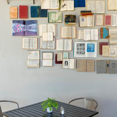 Various books mounted on the wall.
