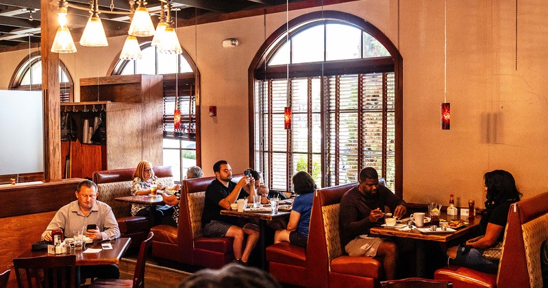 Interior, dining area, guests enjoying their meals and drinks