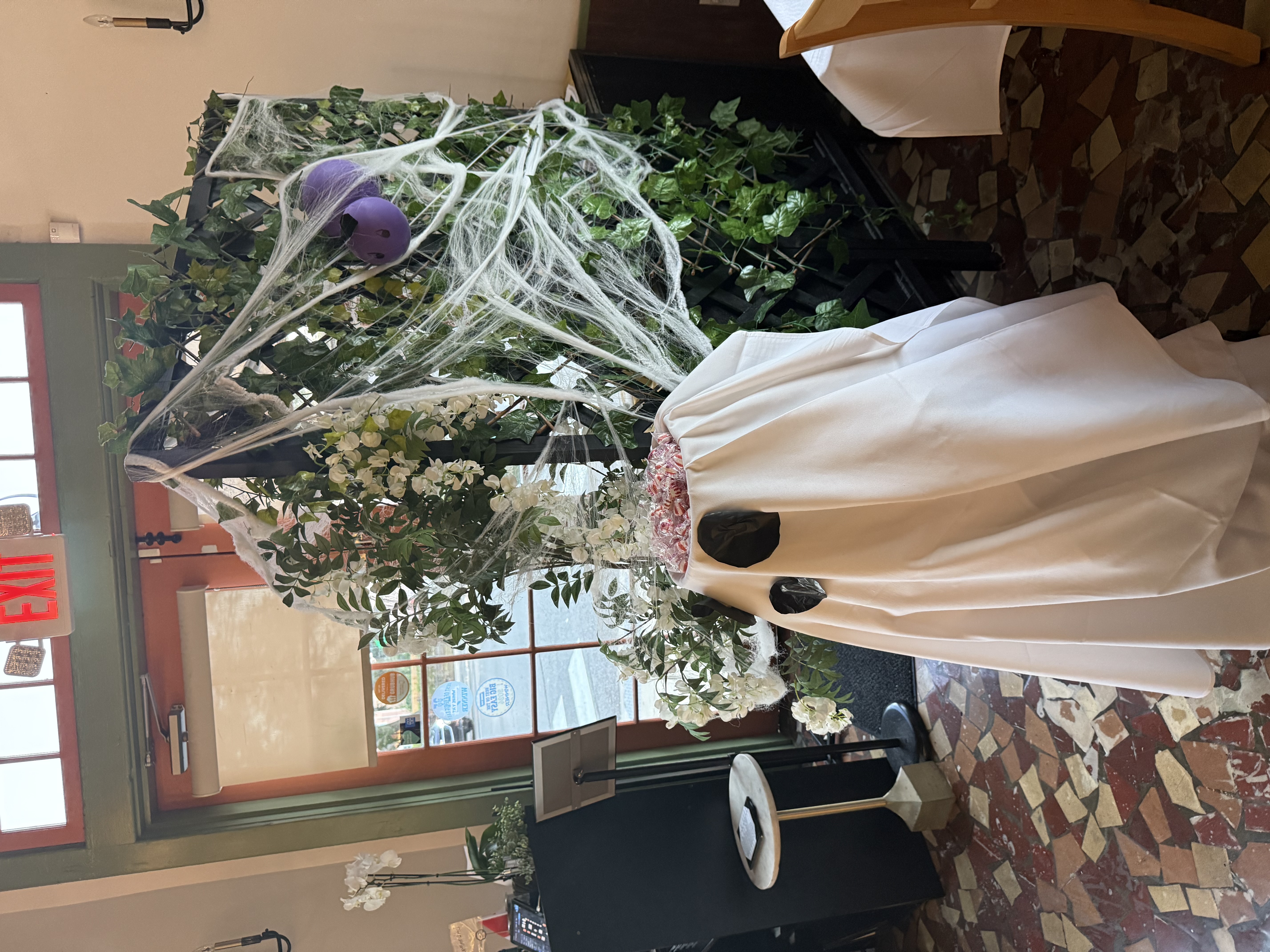 a picture of a fake spider web on a desk-like to resemble halloween