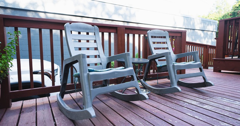 Exterior, swing chairs and table on patio