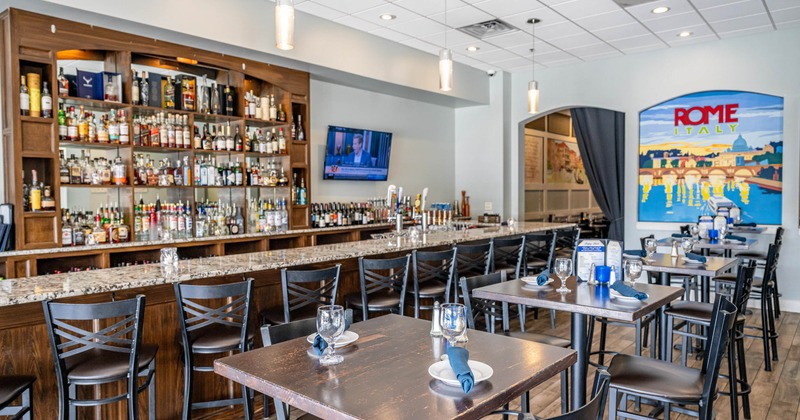 Interior, seating area with a bar in the back