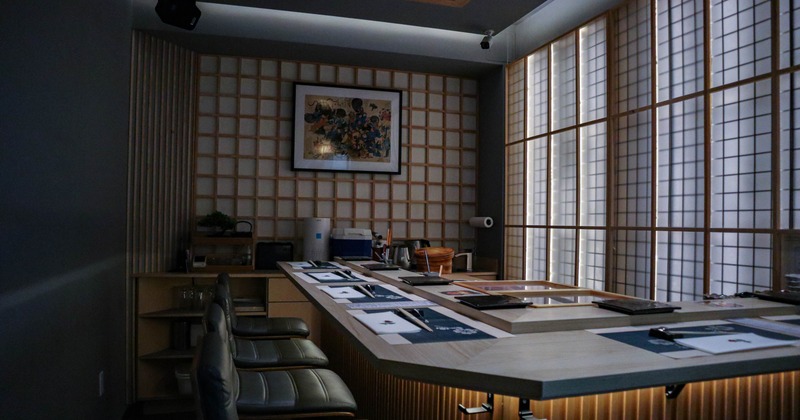 Interior, dining area, sushi bar with stools