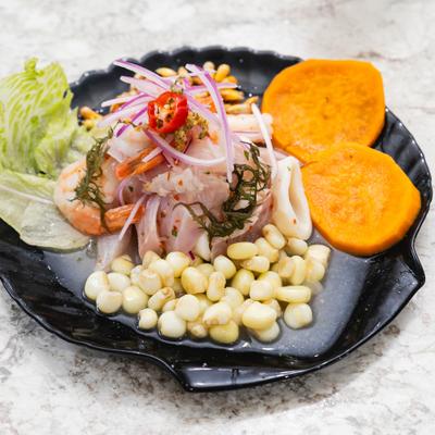 Ceviche paired with corn and sweet potatoes.