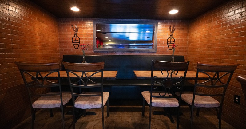 Interior, dining area with two tables