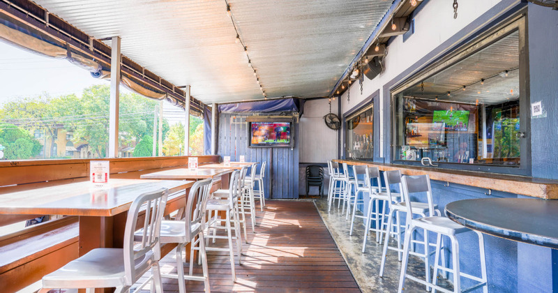Interior, bright lit seating area, sunlight coming through windows
